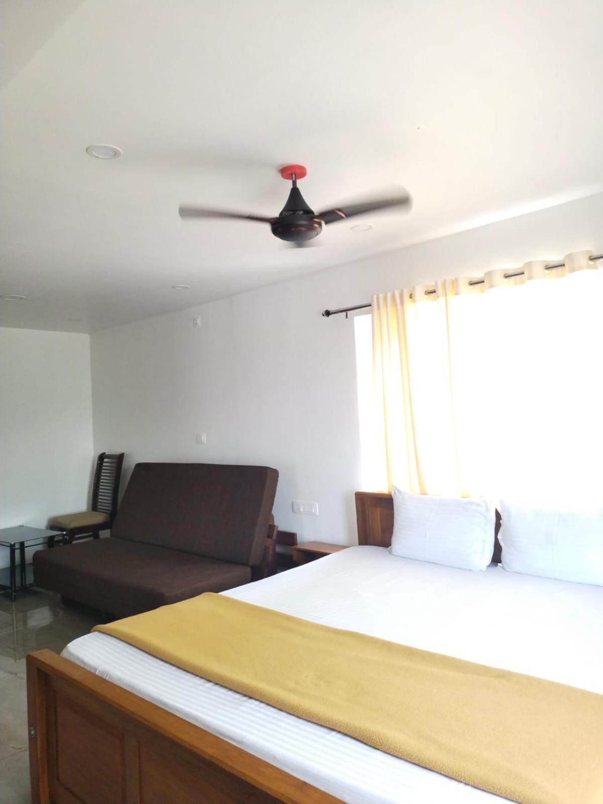 Blossom Valley Cottage Munnar Ruang foto